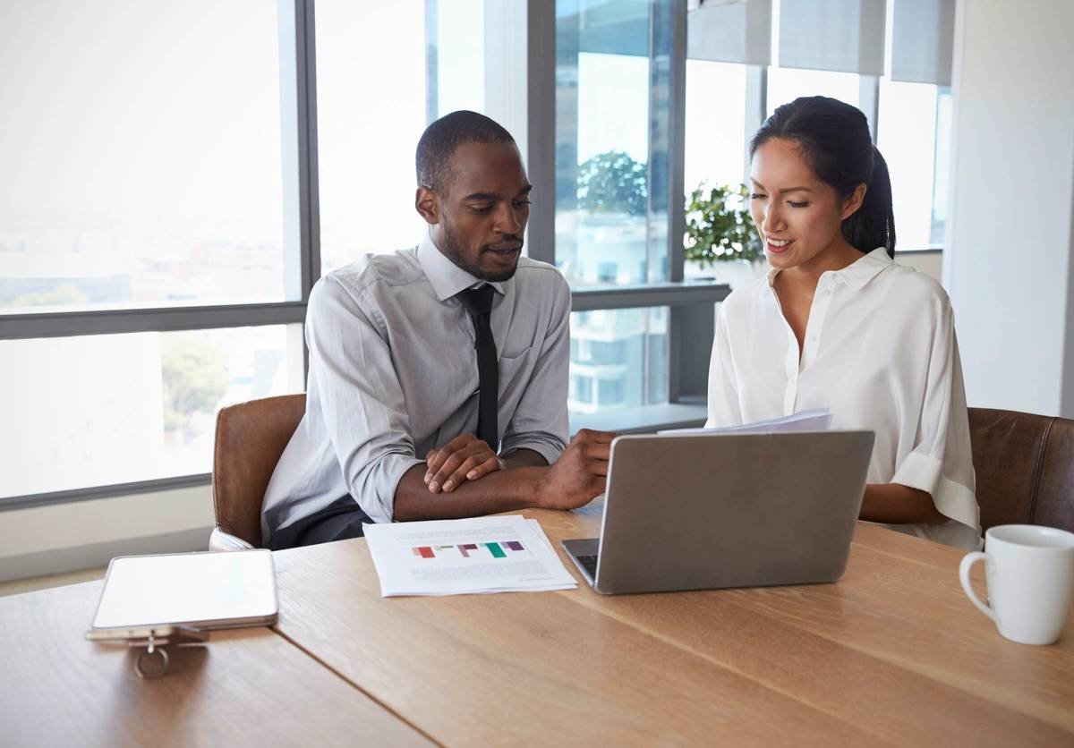 Professionals reviewing a business strategy together